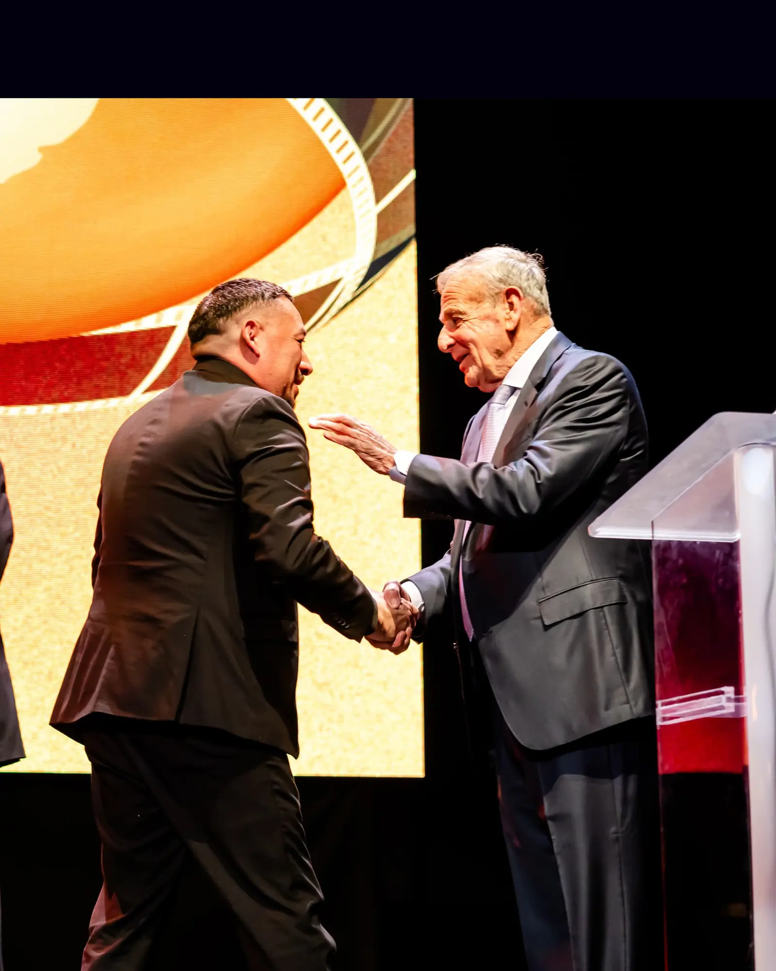Chef Santos Lugo receiving an award at the Golden Globe Awards